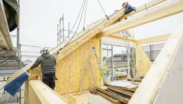 Dachaufstockung-Holzelementbau_Sommergasse-Allschwil-v2__FillWzcwNiw0MDBd.jpg