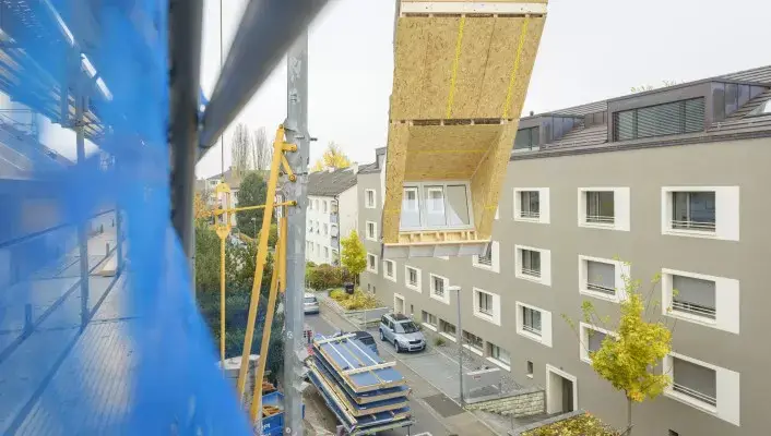 Dachaufstockung-Holzelementbau_Sommergasse-Allschwil-v4__FillWzcwNiw0MDBd.jpg