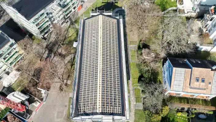 Photovoltaikanlage-Dachsanierung-_Wohngenossenschaft-Niederholz-Riehen-v4__FillWzcwNiw0MDBd.jpeg