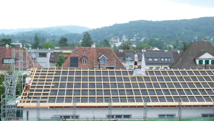 Photovoltaikanlage-Dachsanierung-_Wohngenossenschaft-Niederholz-Riehen-v5__FillWzcwNiw0MDBd.JPG